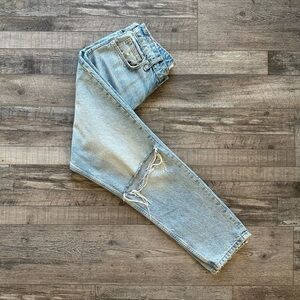 Distressed straight leg light wash jeans